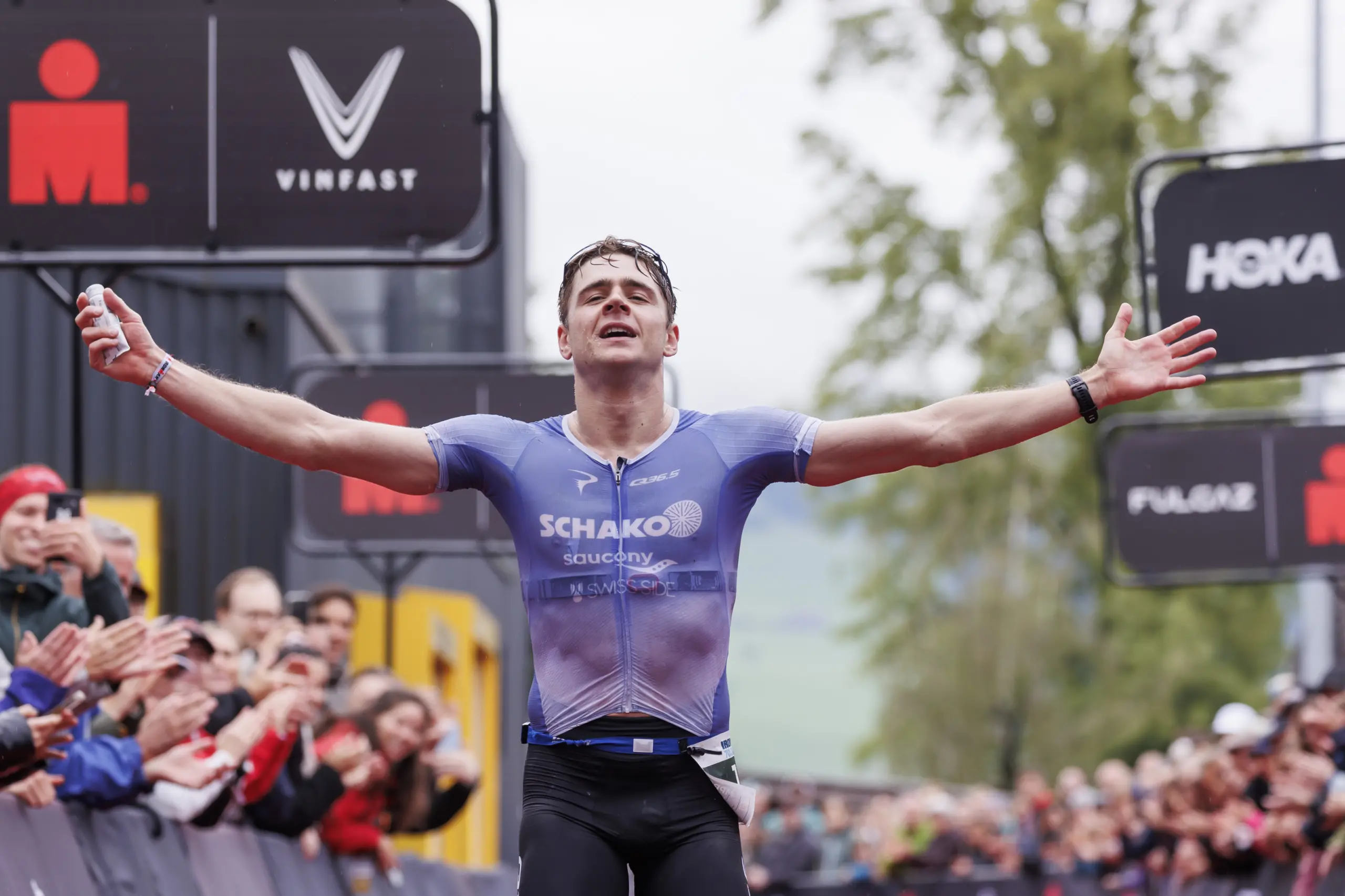 RAPPERSWIL, SWITZERLAND - JUNE 02: Fabian Meeusen of Switzerland reacts after crossing the finish line third during the 2024 IRONMAN 70.3 Switzerland on June 02, 2024 in Rapperswil, Switzerland. (Photo by Jan Hetfleisch/Getty Images for IRONMAN )