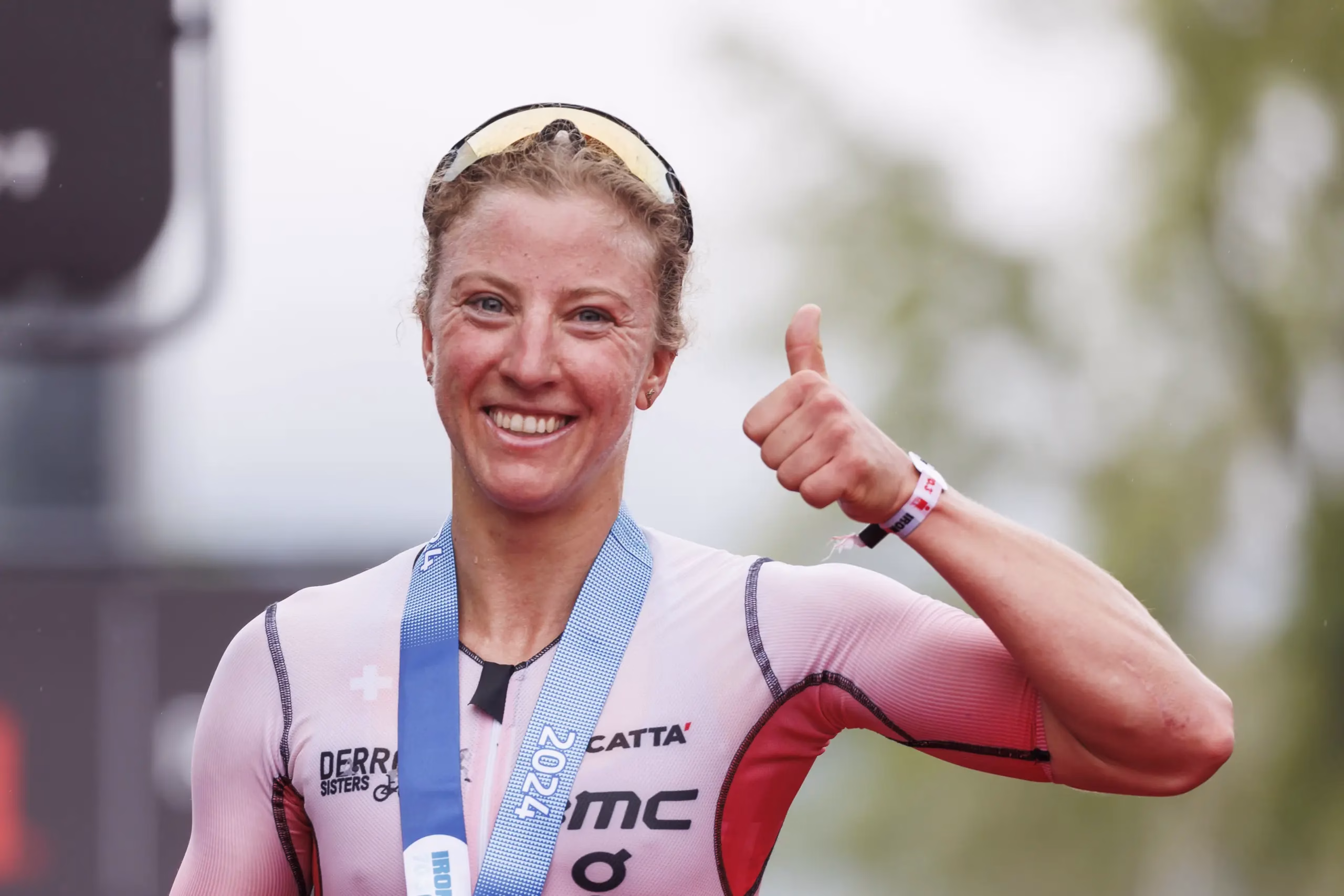 RAPPERSWIL, SWITZERLAND - JUNE 02: Julie Derron of Switzerland reacts after crossing the finisch line first during the 2024 IRONMAN 70.3 Switzerland on June 02, 2024 in Rapperswil, Switzerland. (Photo by Jan Hetfleisch/Getty Images for IRONMAN )