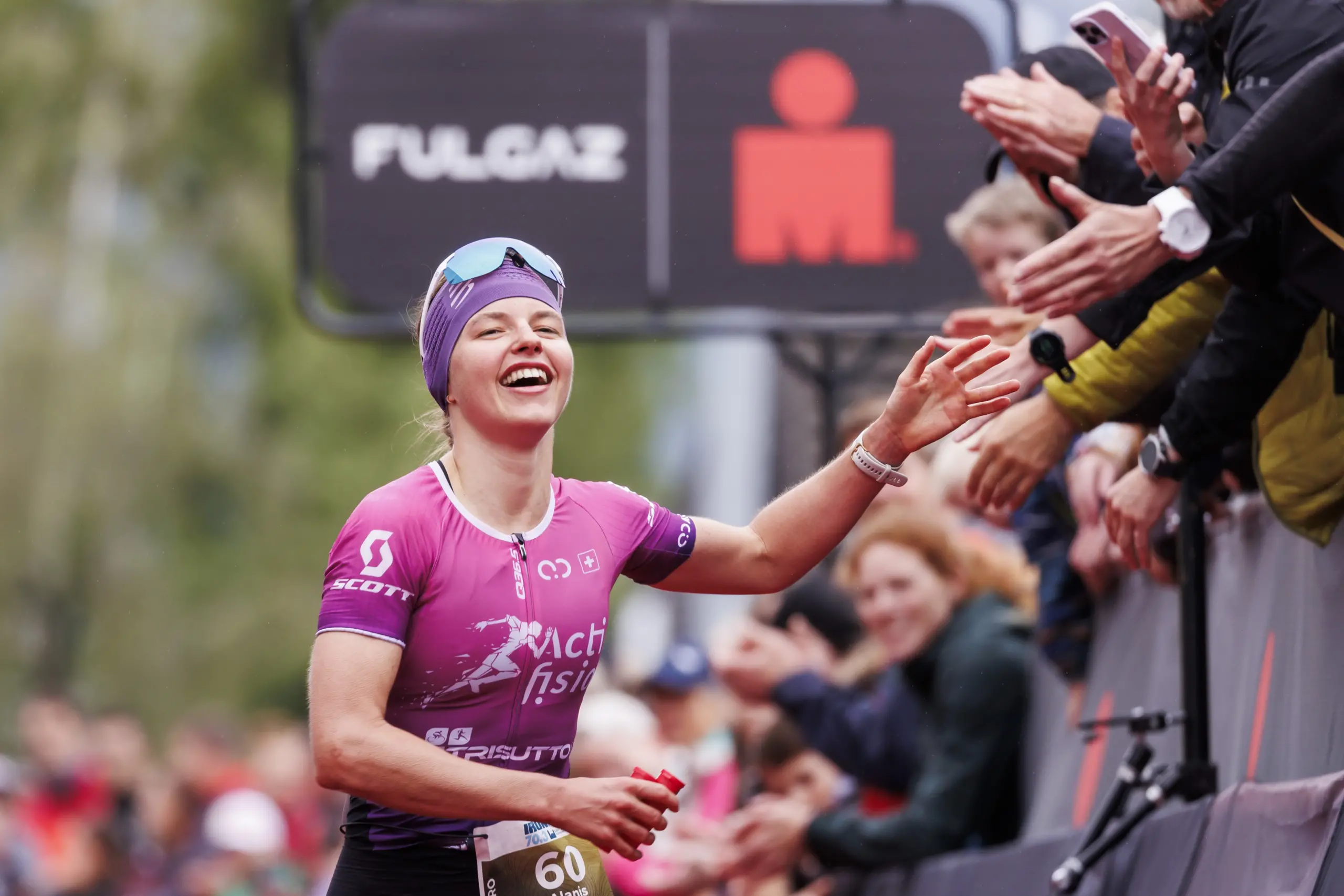 RAPPERSWIL, SWITZERLAND - JUNE 02: Alanis Siffert of Switzerland reacts after crossing the finish line second during the 2024 IRONMAN 70.3 Switzerland on June 02, 2024 in Rapperswil, Switzerland. (Photo by Jan Hetfleisch/Getty Images for IRONMAN )